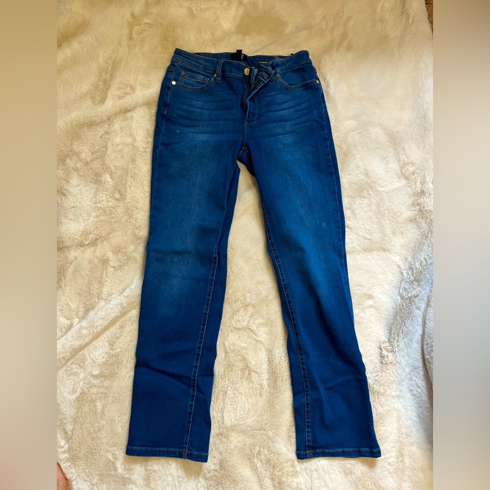 Blue straight jeans, not too skinny or tight